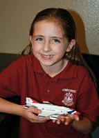 Alyssa with her plane